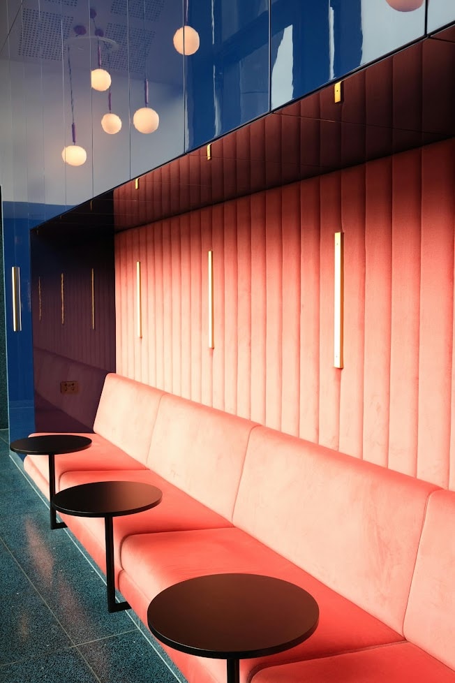 Coral wall banquette — residential upholstery by All Upholstery